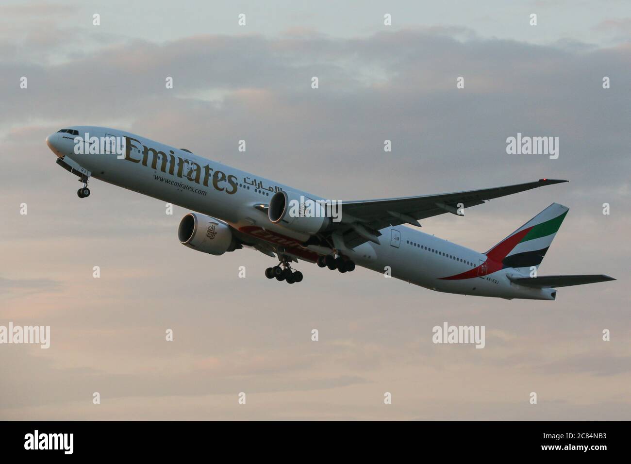 An Emirates Boeing 777-31H(ER) departs London Heathrow Airport Stock Photo