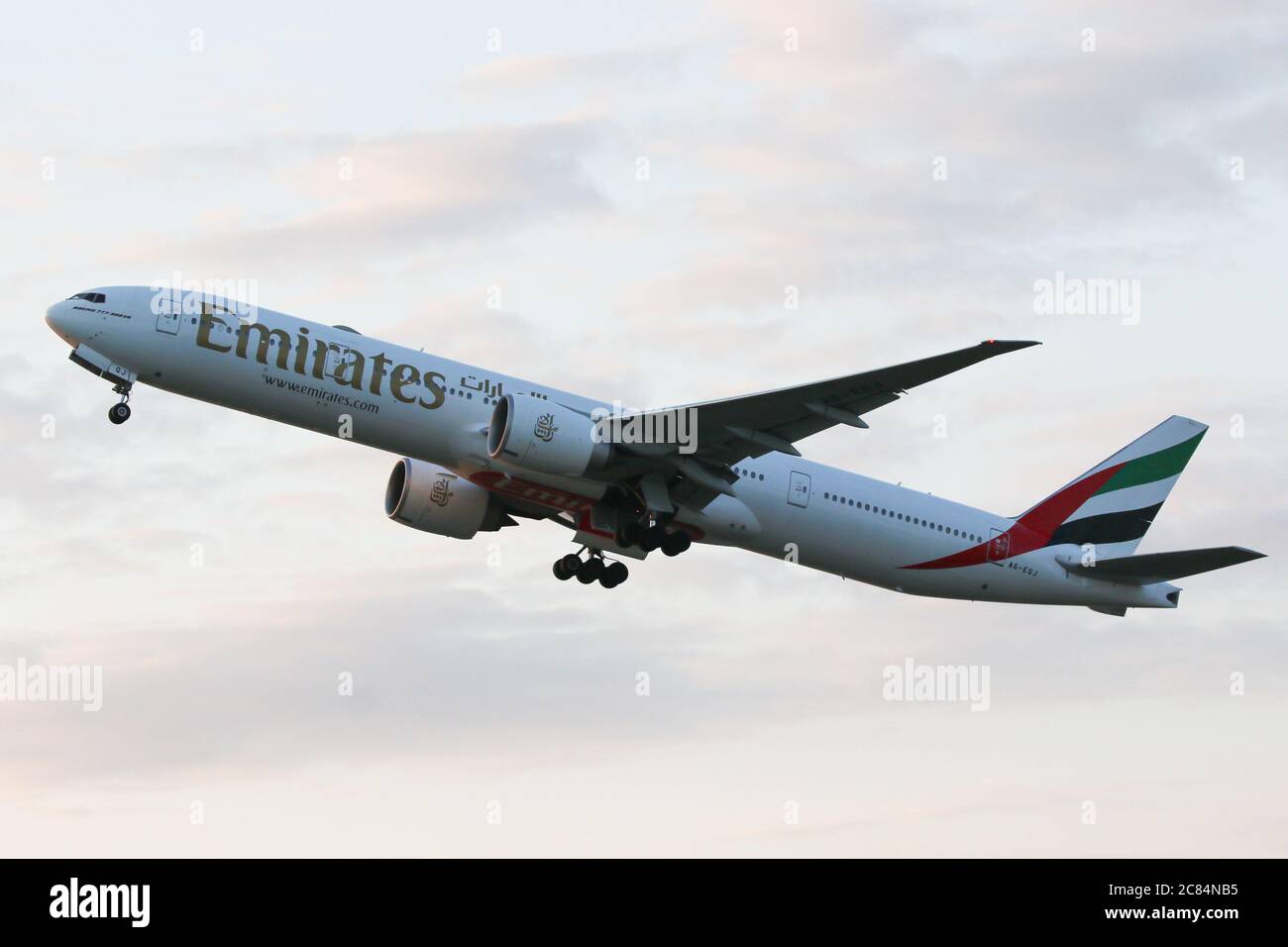 An Emirates Boeing 777-31H(ER) departs London Heathrow Airport Stock Photo
