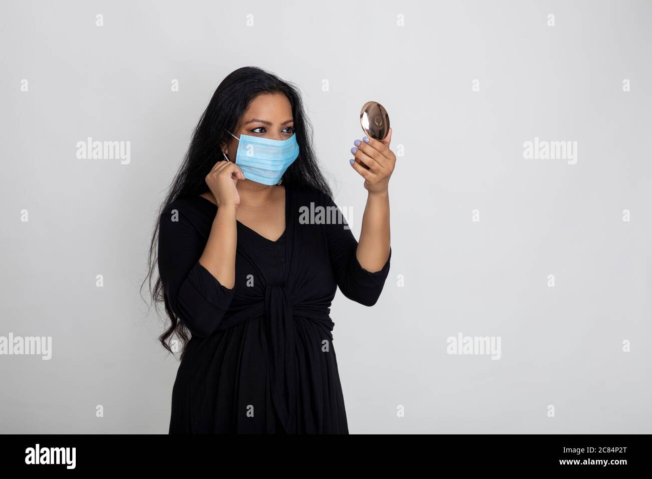 Face covered in black mask High Resolution Stock Photography and Images ...