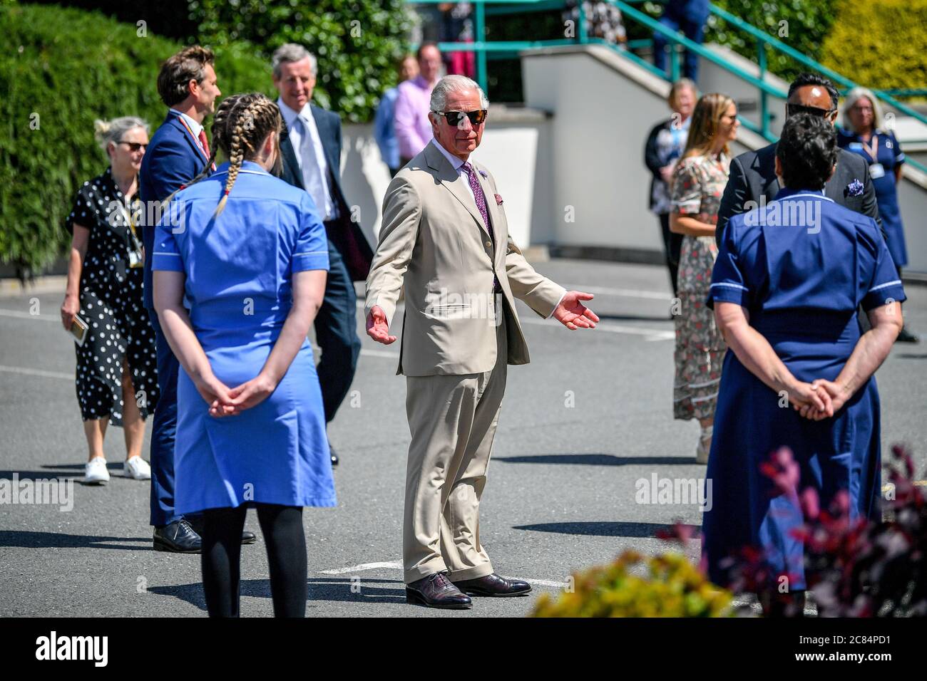 The Prince of Wales chats with care workers as the Duke and Duchess of Cornwall visit St Austell Healthcare, the Wheal Northey Centre, to recognise and thank staff for their efforts during Covid-19. Stock Photo