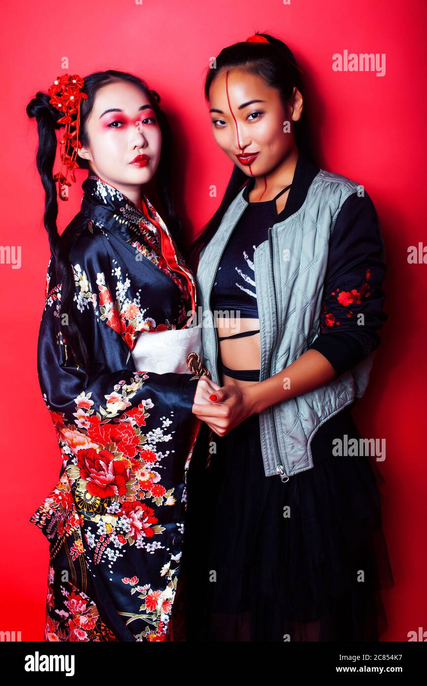 two pretty geisha girls friends: modern asian woman and traditional ...