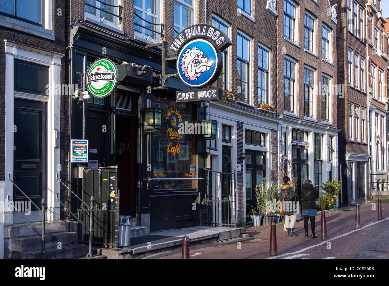 Amsterdam, Netherlands - January 15 2019: Outside the world famous 'The Bulldog' coffee shop in the De Wallen Red Light District of Amsterdam. Stock Photo