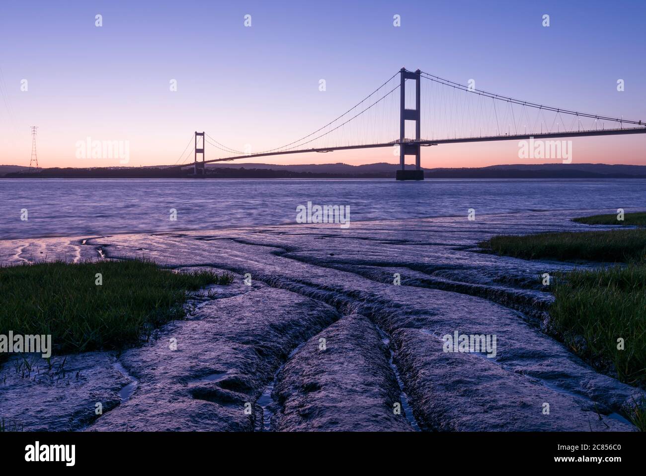 The Severn Bridge across the River Severn between England and Wales at Aust, Gloucestershire, England. Stock Photo