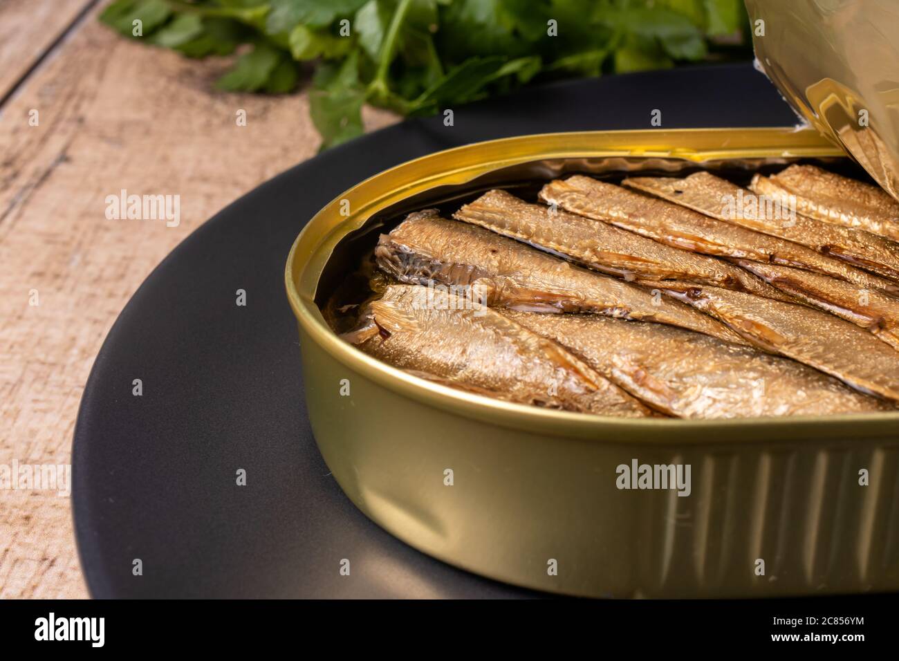 Canned fish - smoked sprats in oil. Conserve from herring, sprats and other small fish. Stock Photo