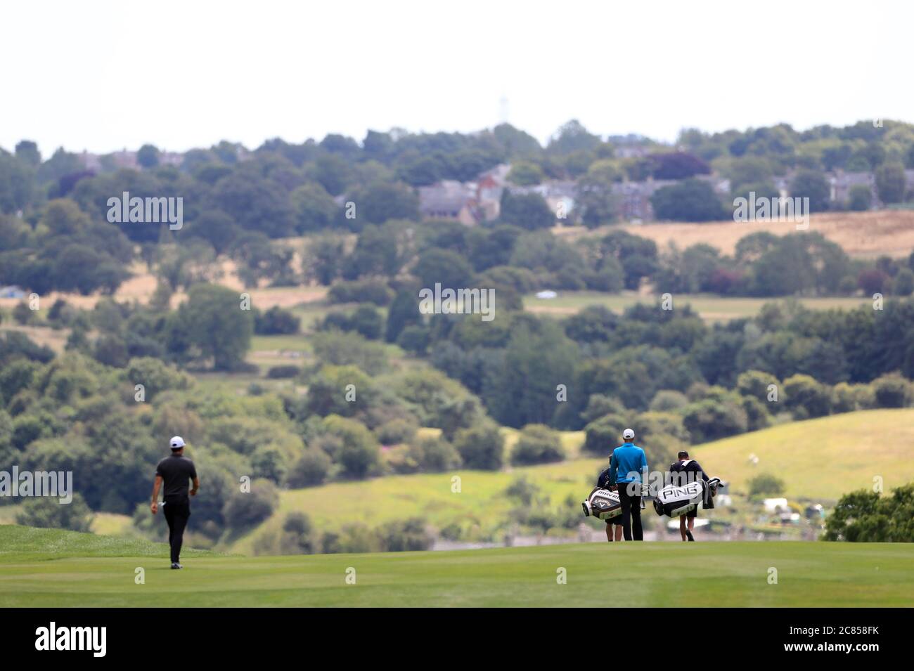 Golfers on course close house golf club hires stock photography and