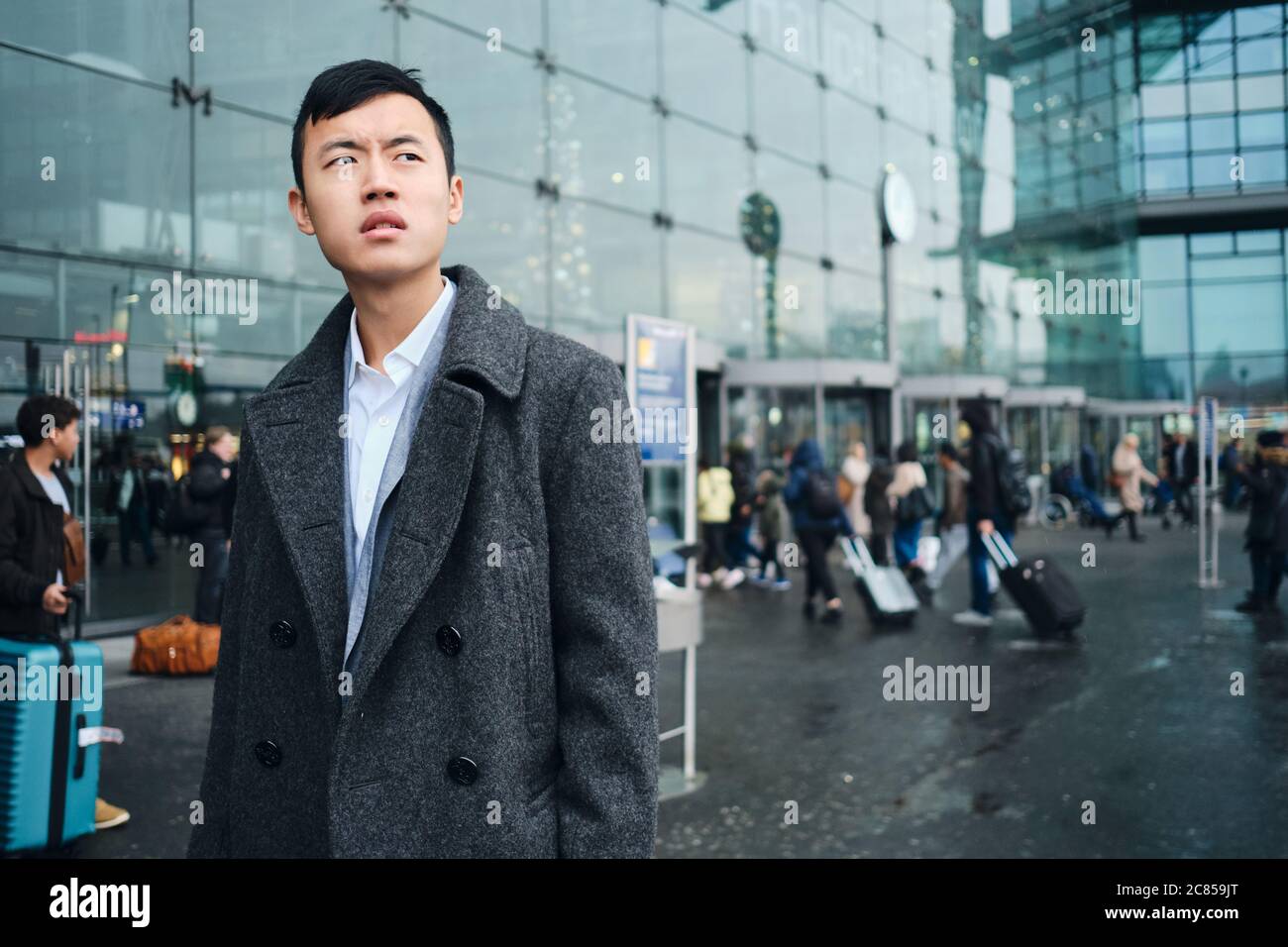 Stylish young businessman in suit on city street hi-res stock ...