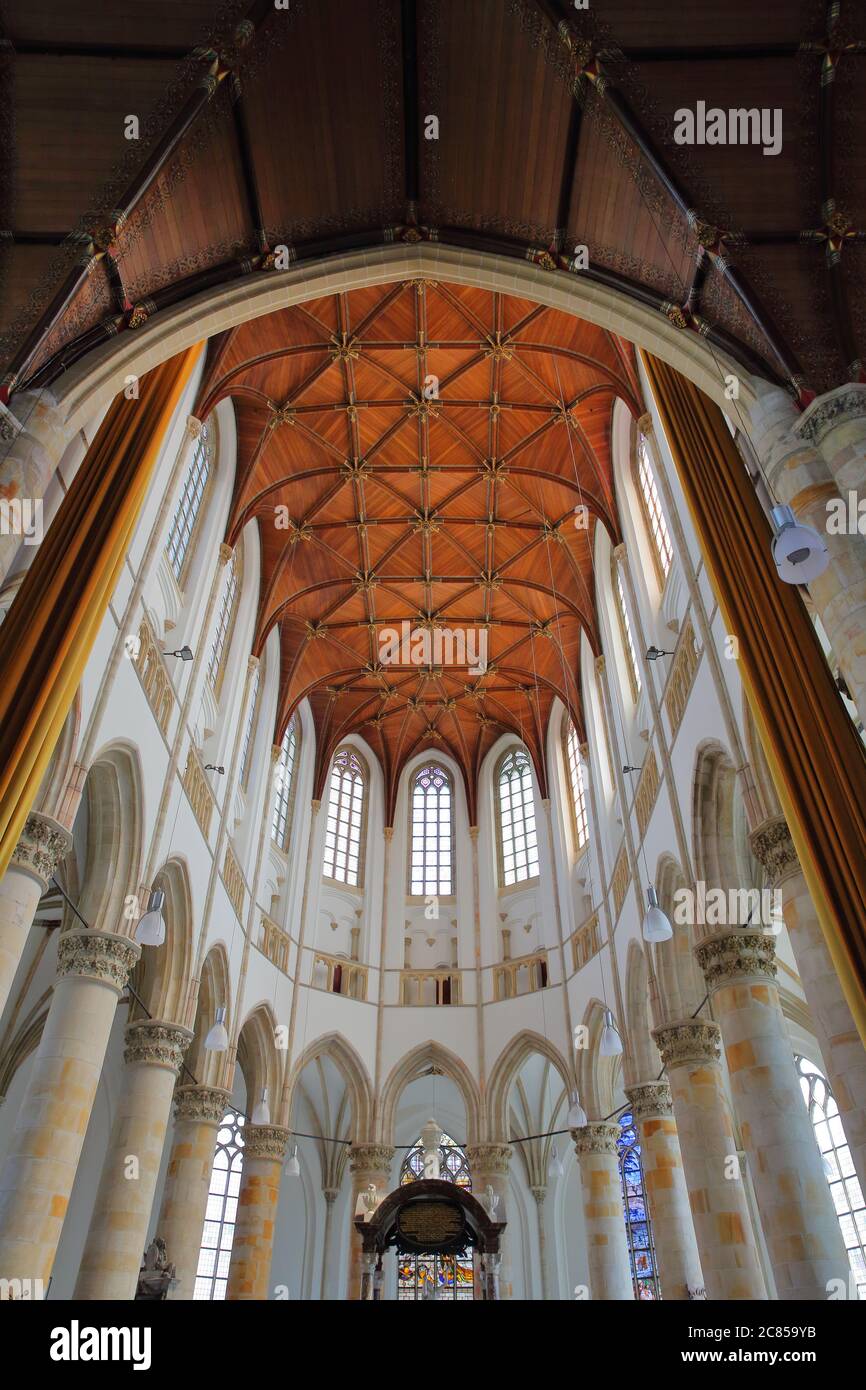 THE HAGUE, NETHERLANDS - JUNE 20, 2020: The interior of Grote of Sint Jacobskerk (historic church with an iconic tower),with a wooden vaulted ceilling Stock Photo