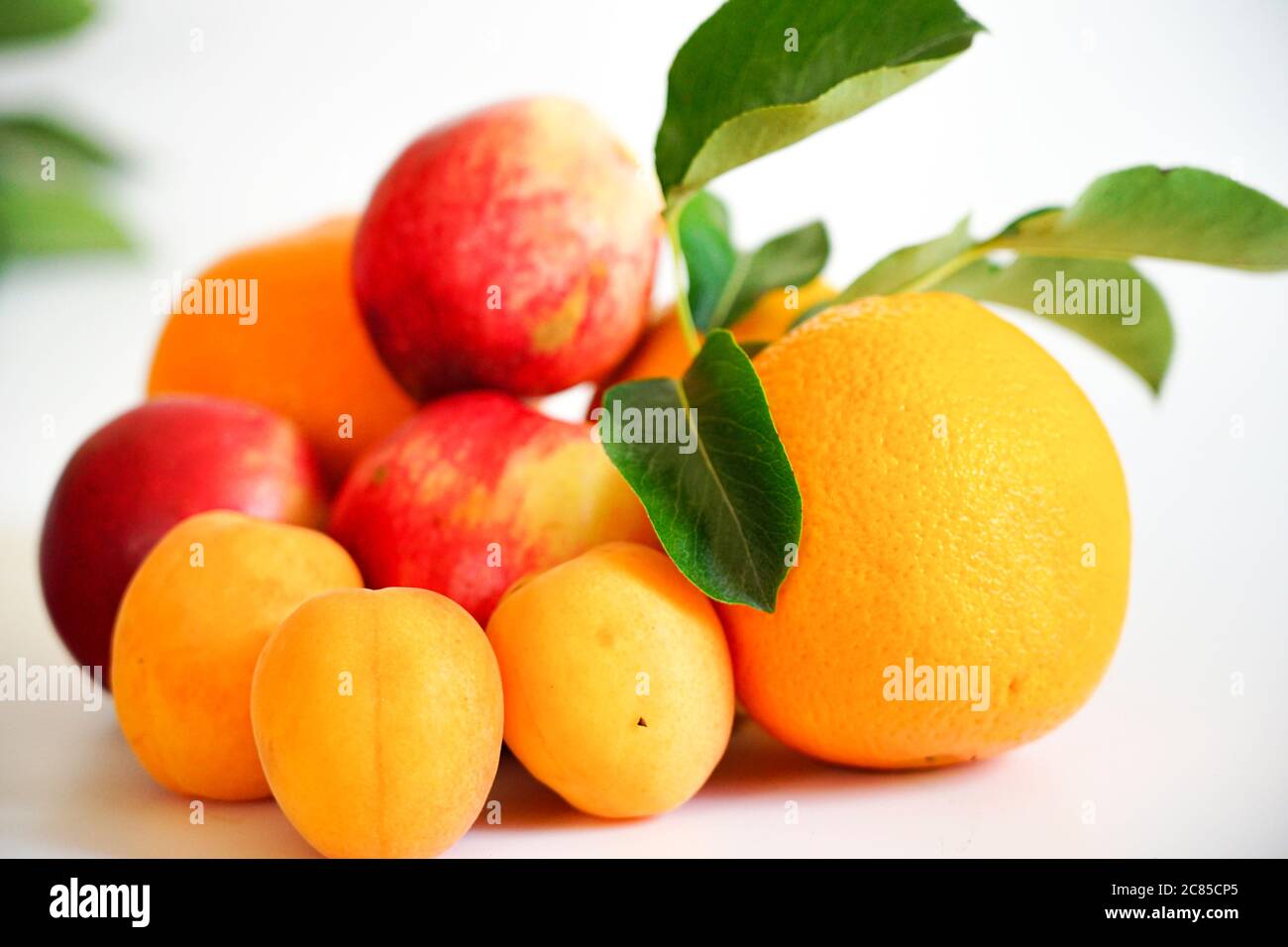 three large oranges lie on a white background Stock Photo