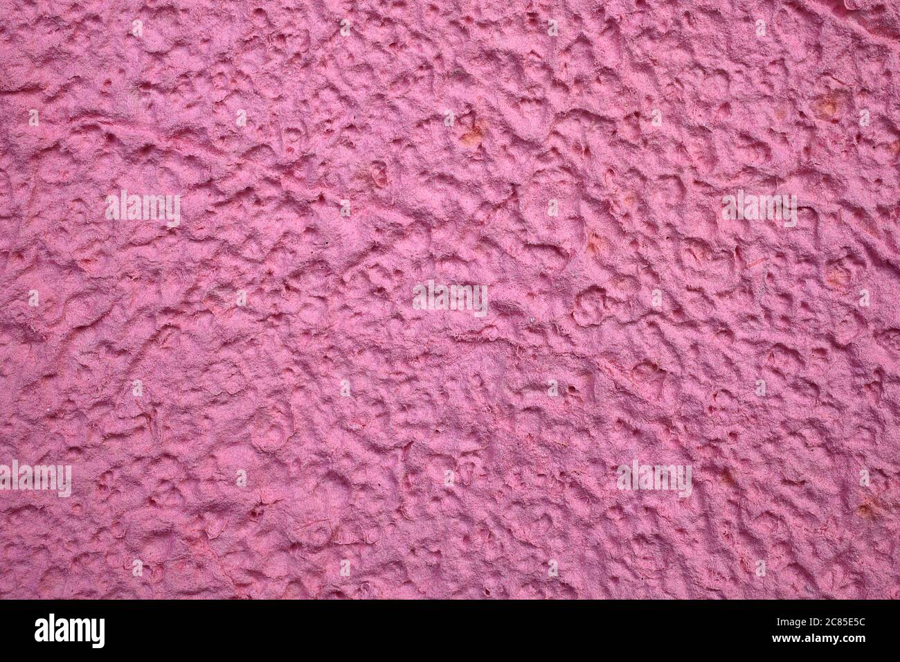 Magenta pink papier mache texture blank paper background Stock Photo