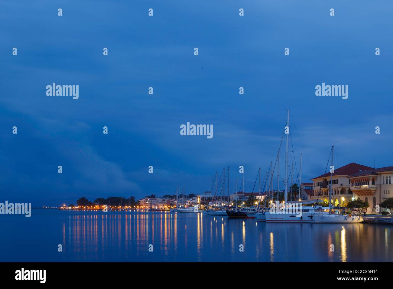 Night view of Preveza town, reflected in the waters of the Ambracian gulf. Epirus, Greece. Stock Photo