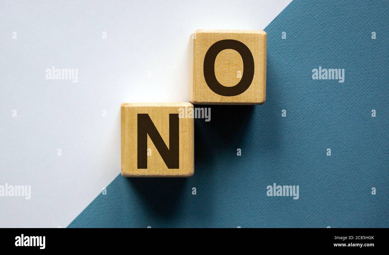 Non Stackble Word Wood block with word 'no' stacking as step stair on paper white and ...
