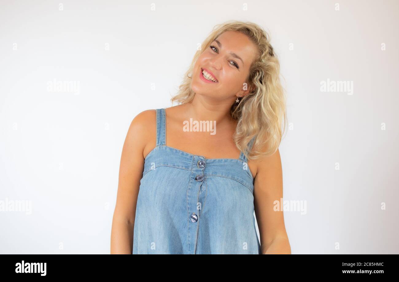 Woman blonde in blue dress hi-res stock photography and images - Alamy