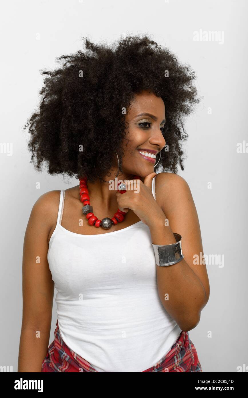 Portrait of young beautiful African woman with Afro hair Stock Photo ...