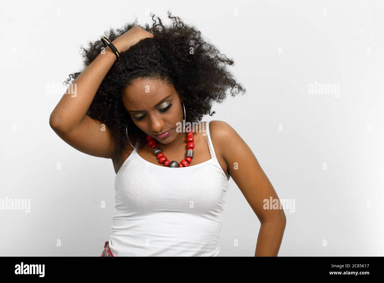 Portrait of young beautiful African woman with Afro hair Stock Photo ...