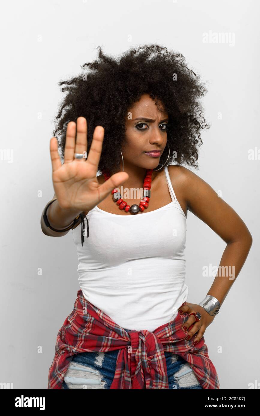 Portrait of young beautiful African woman with Afro hair Stock Photo ...