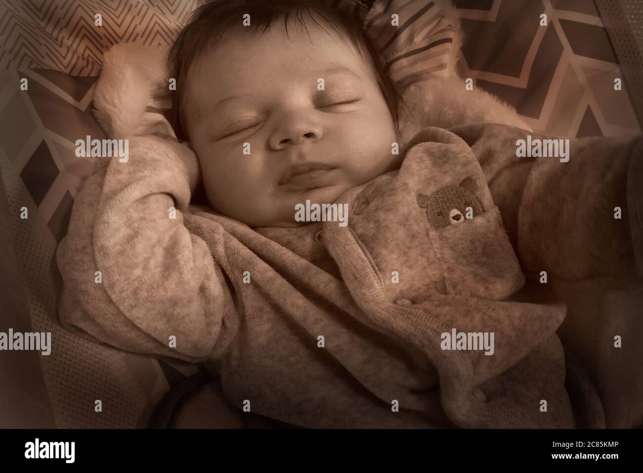 A twomonthold baby sleeping Stock Photo Alamy