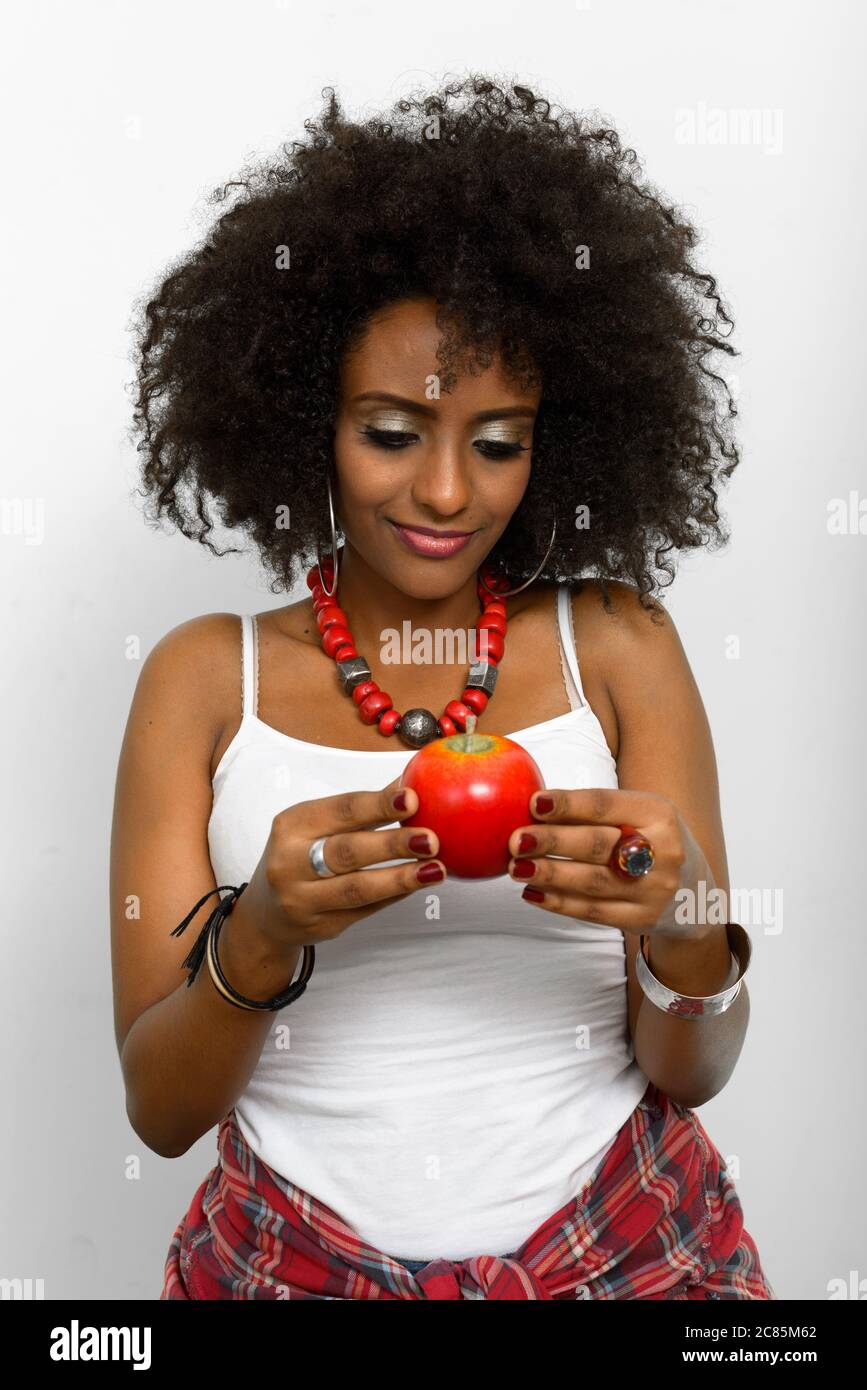 Portrait of young beautiful African woman with Afro hair Stock Photo ...