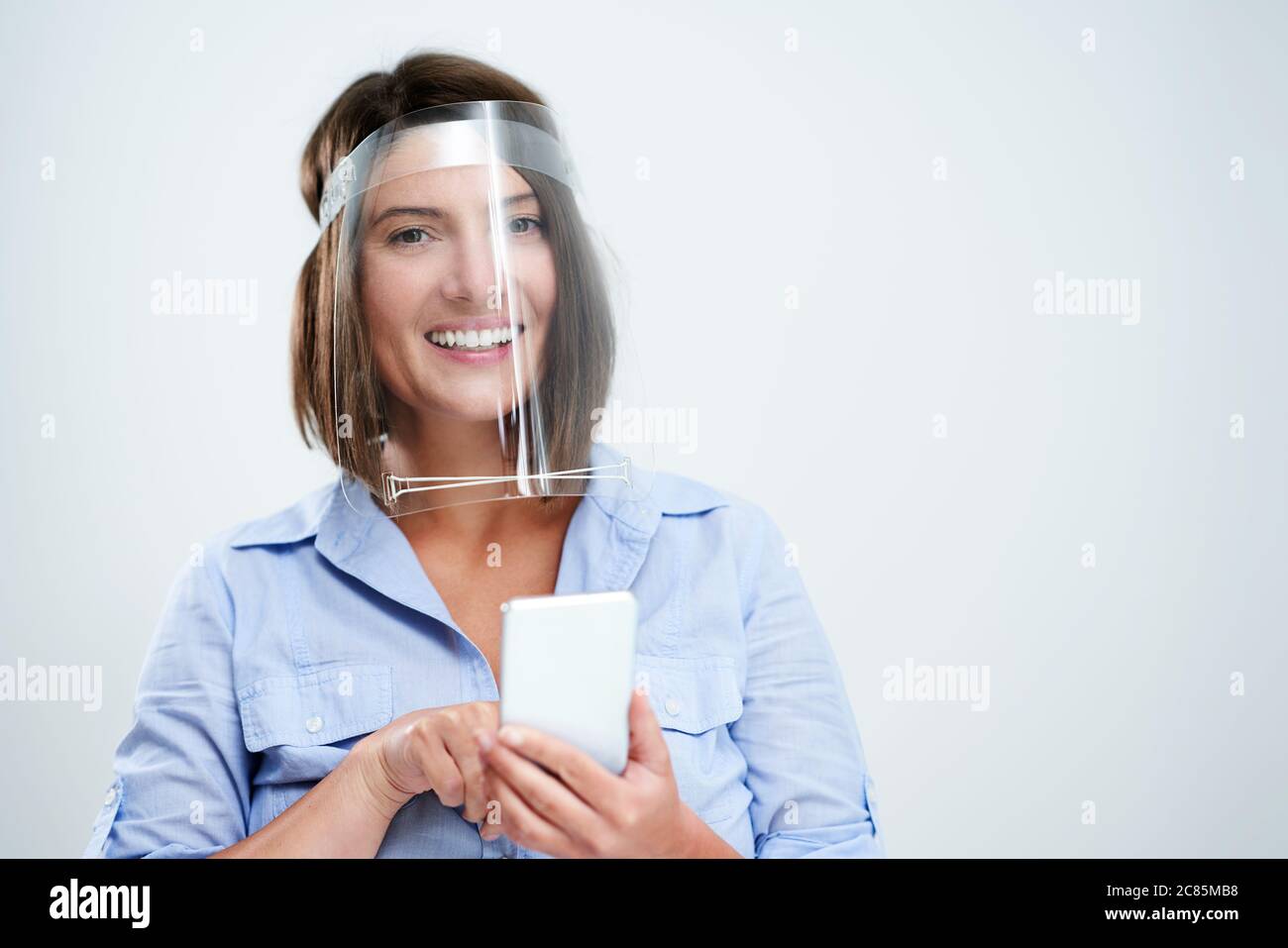 Holding mask over his face hi-res stock photography and images - Alamy
