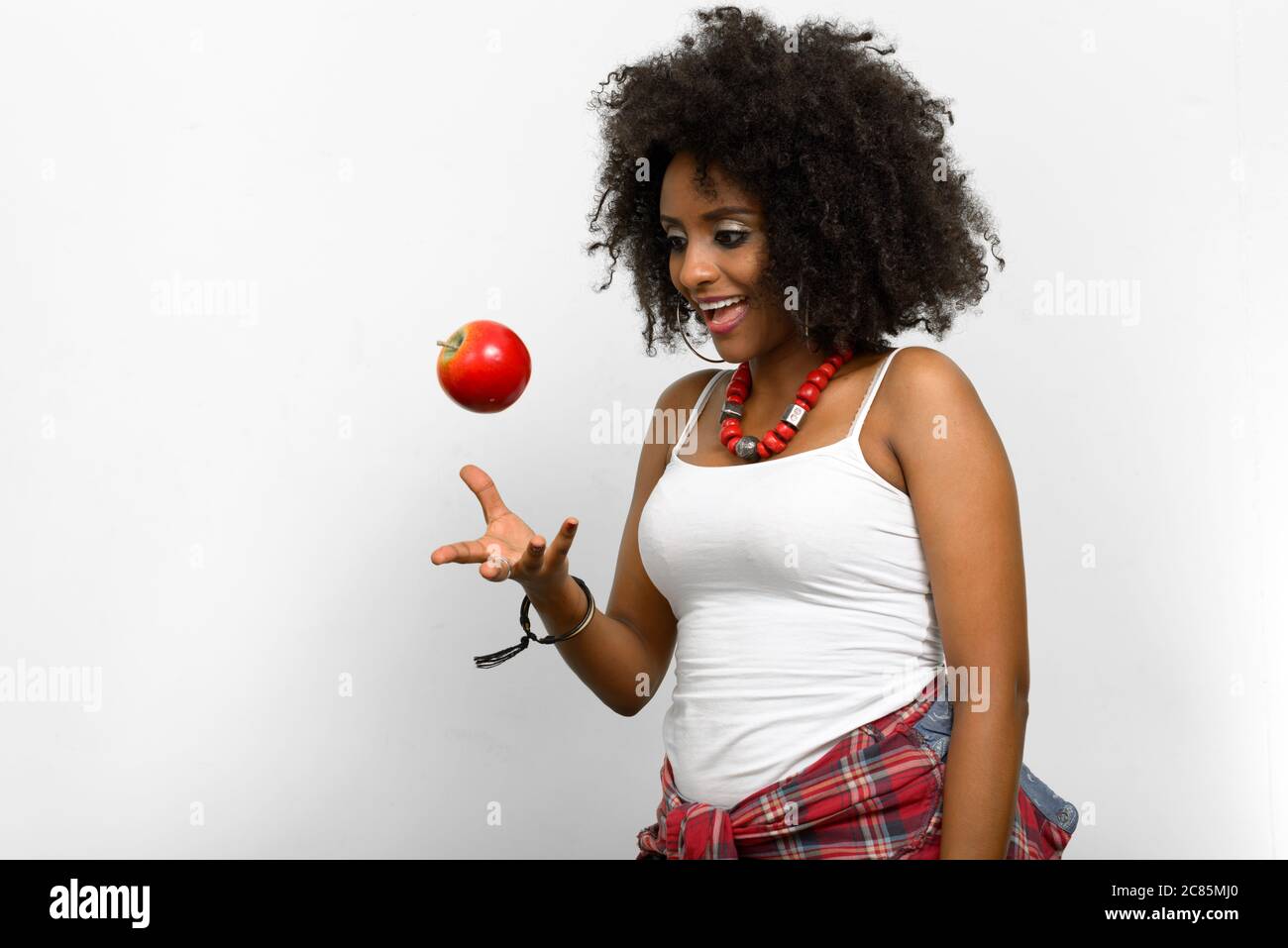 Portrait of young beautiful African woman with Afro hair Stock Photo ...