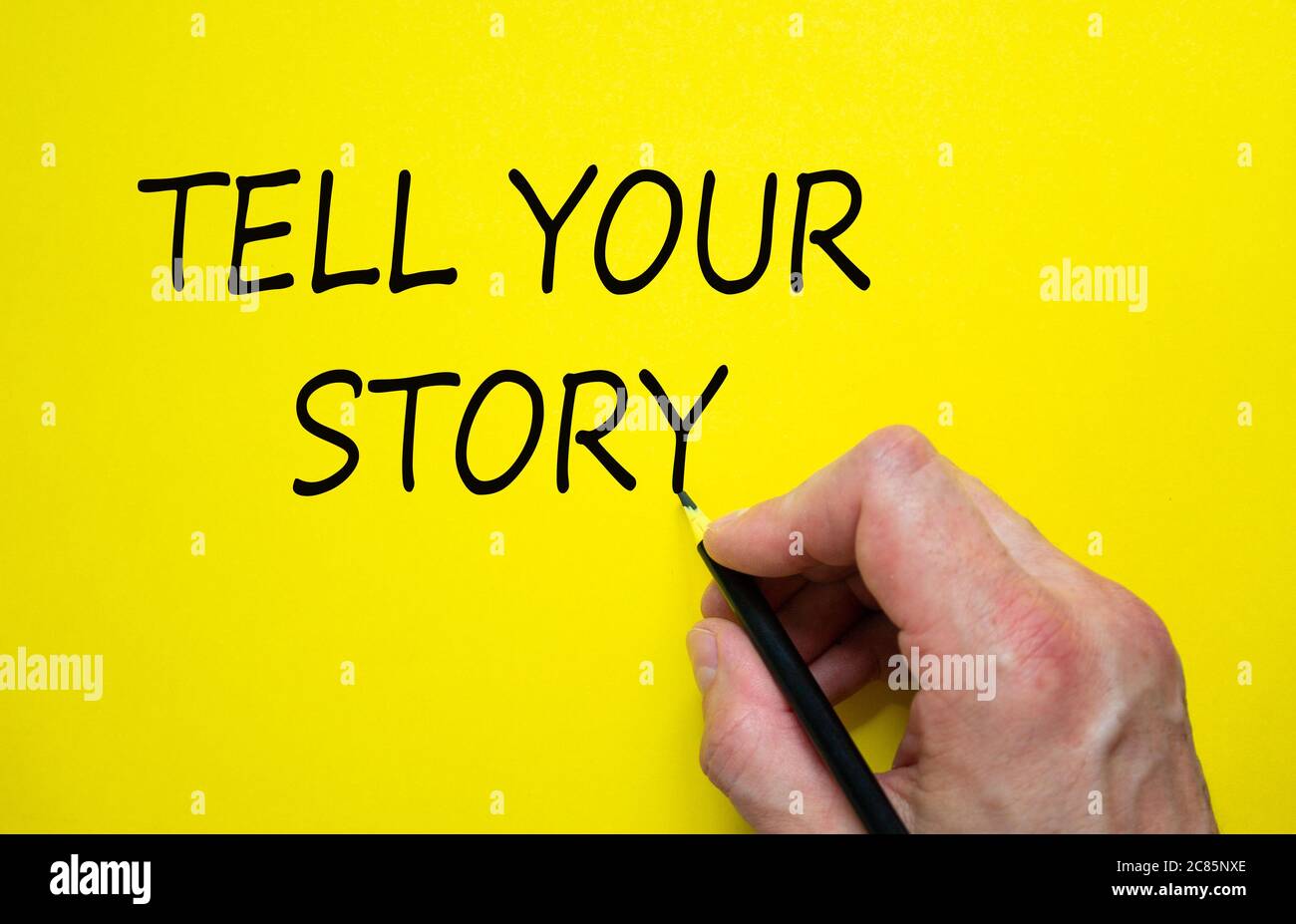 Hand Writing Tell Your Story Isolated On Yellow Background Business Concept Stock Photo Alamy Hand Writing Tell Your Story Isolated On Yellow Background Business Concept Stock Photo Alamy