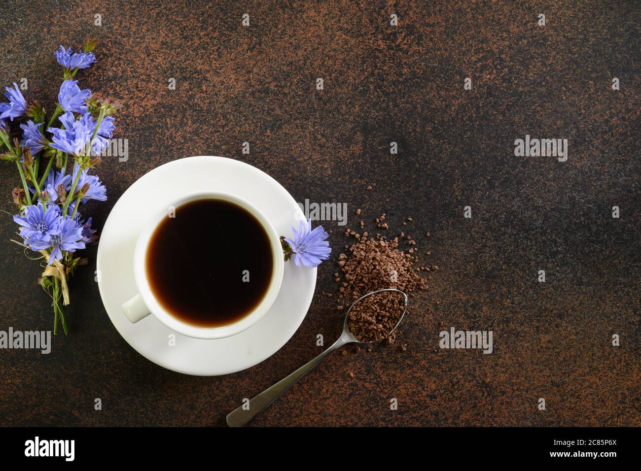 Chicory drink and flowers. Healthy herbal beverage, coffee substitute