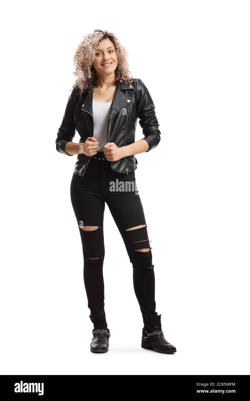 Full length portrait of a trendy young woman in a black leather jacket and curly blond hair isolated on white background Stock Photo