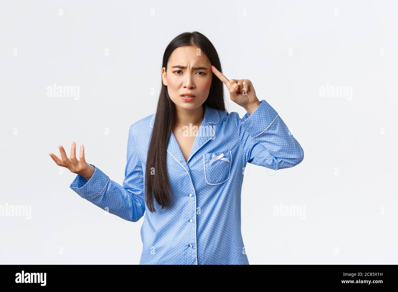 Someone Bothered Bothered and confused asian girl complaining over someone acting stupid ...