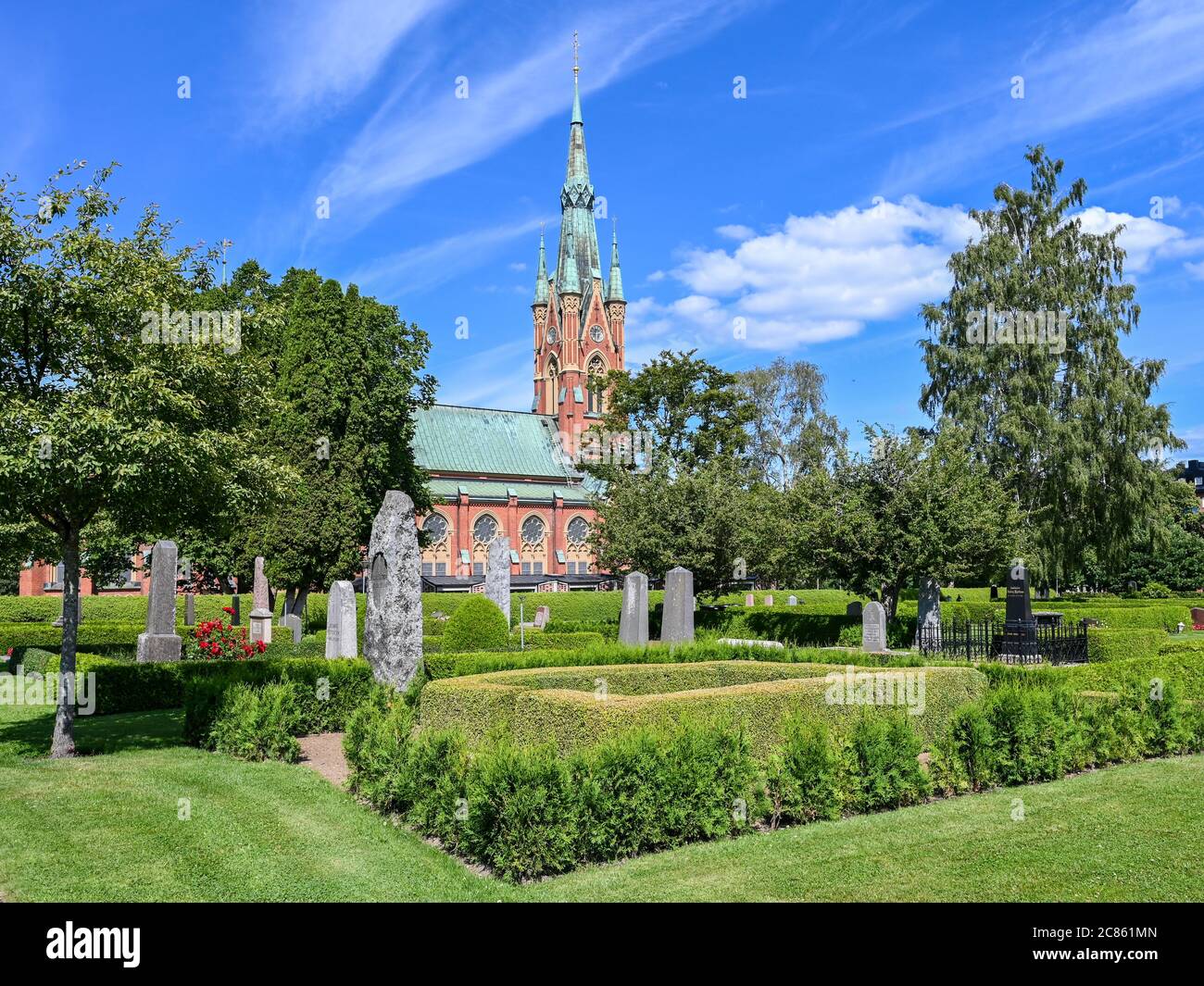 The Matteus church and its churchyard Norrkoping, Sweden. The church located in Folkparken, a city park of Norrkoping, was opened in 1892. Stock Photo