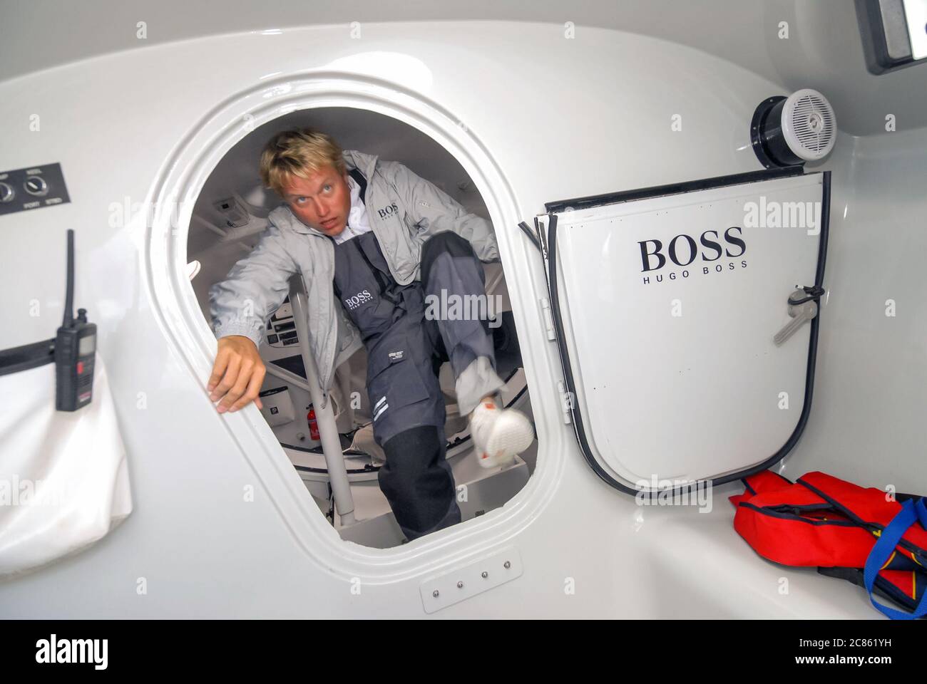 Solent, August 6th 2006: Sailor Alex Thomson on the Hugo Boss yacht Stock Photo