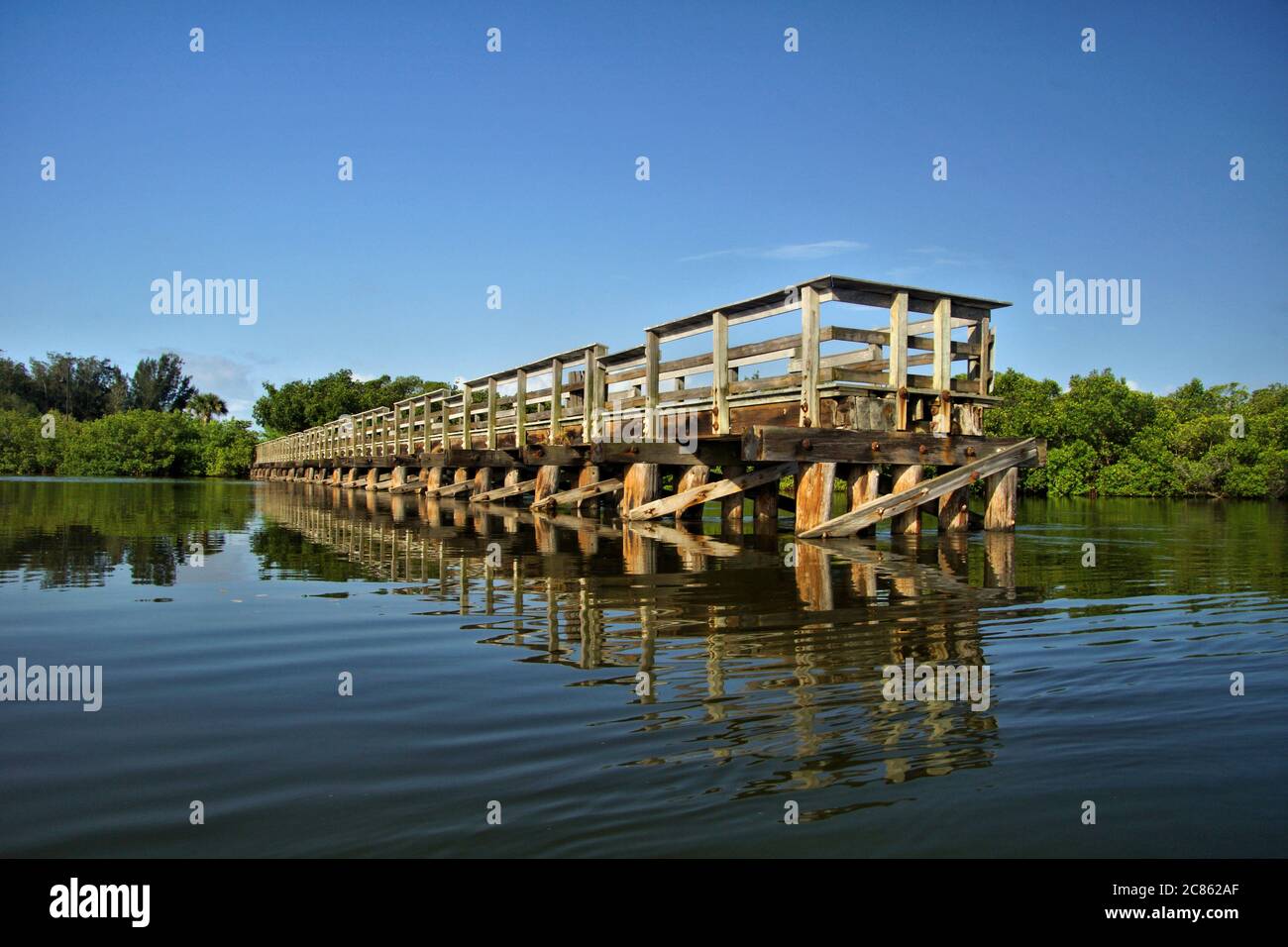 Fishing pier on Coral Creek near the Intercoastal Waterway in Placida