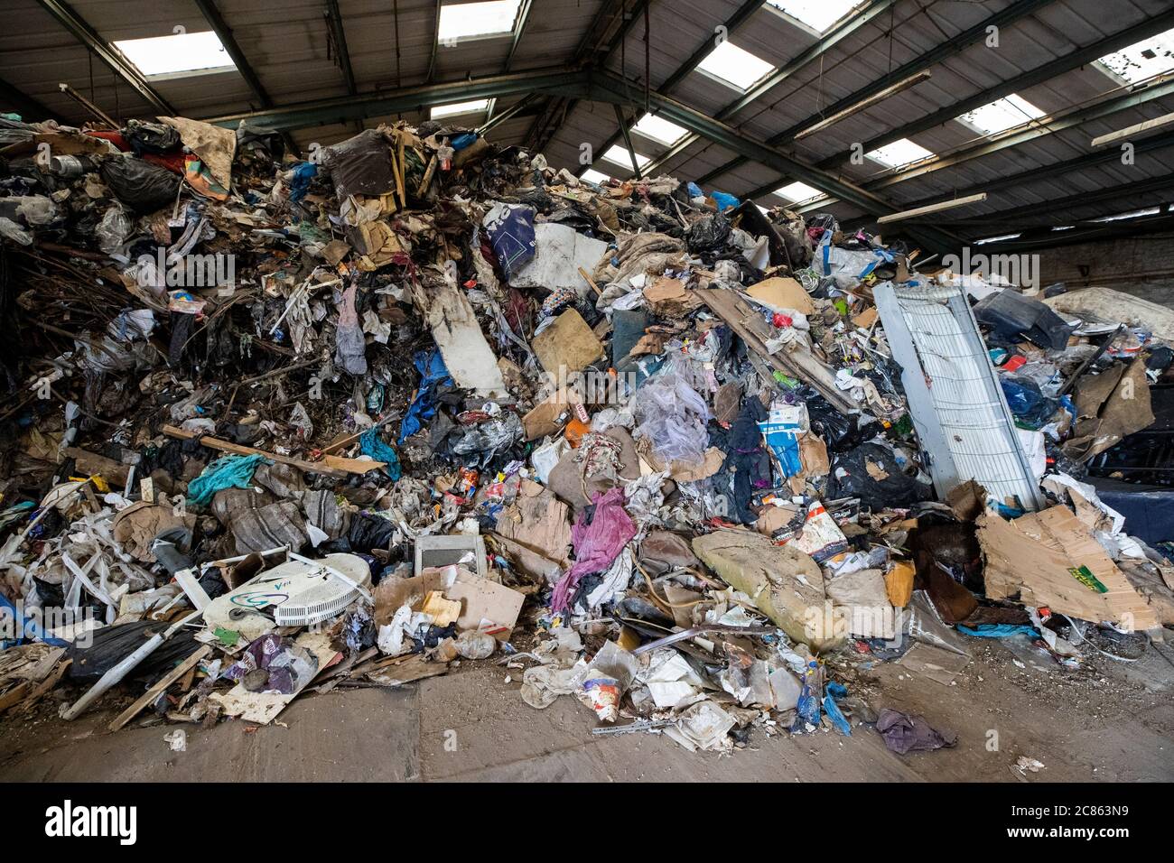 Domestic waste piled high at an illegal dump in a unit of Edenderry