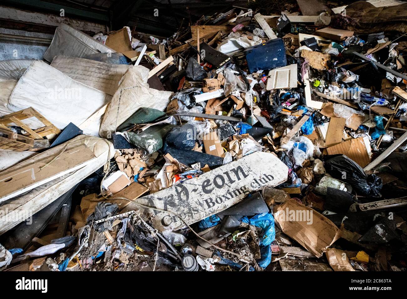 Domestic waste piled high at an illegal dump in a unit of Edenderry