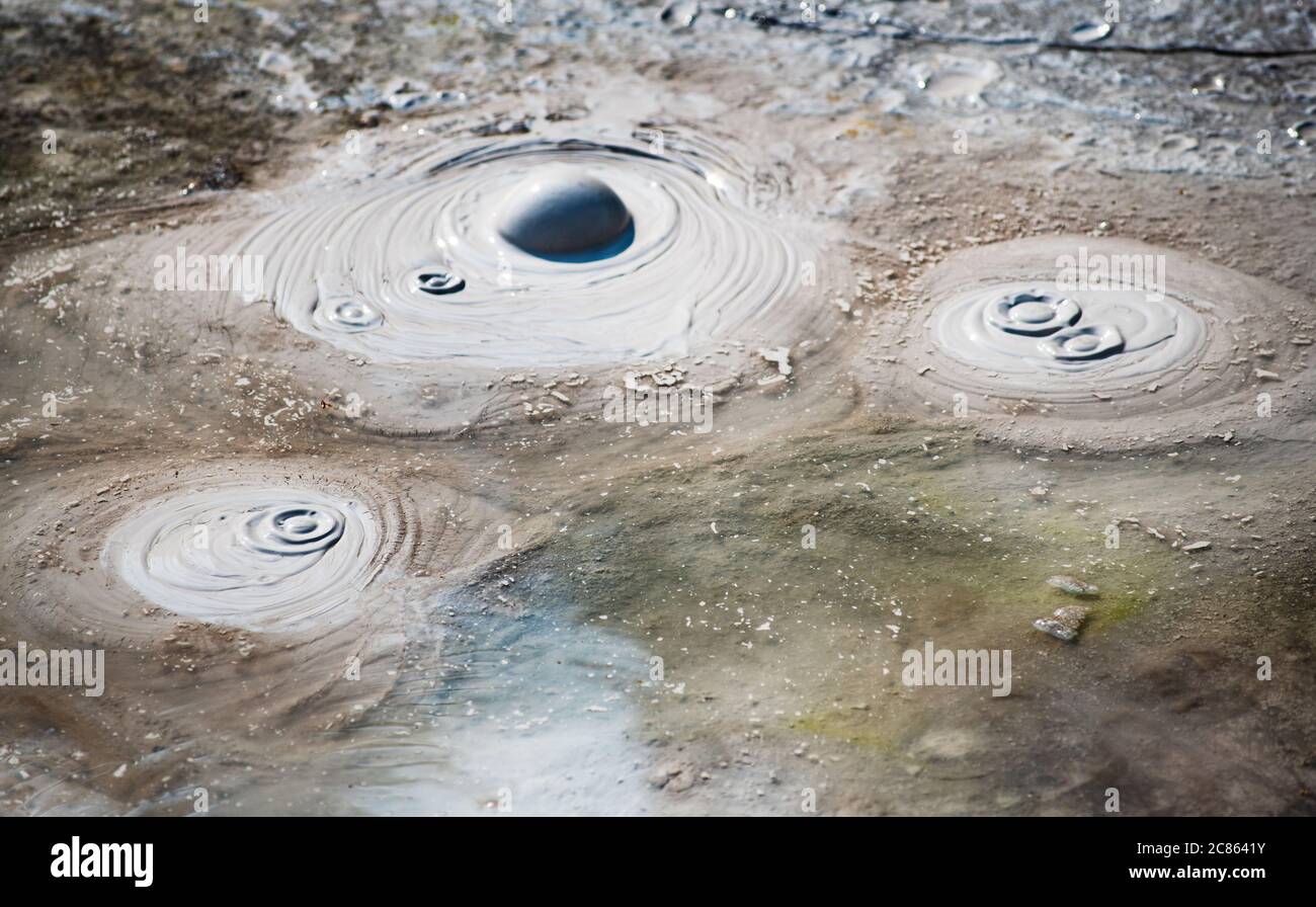 Geothermal mud pool along artists paint pot trail in Yellowstone National Park, Wyoming Stock Photo