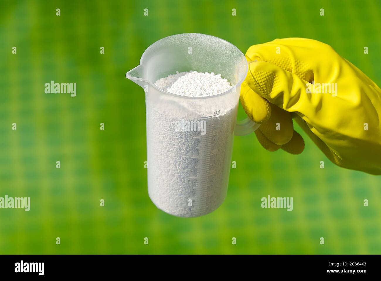 addition of chlorine powder for the pool to remove algae and disinfect