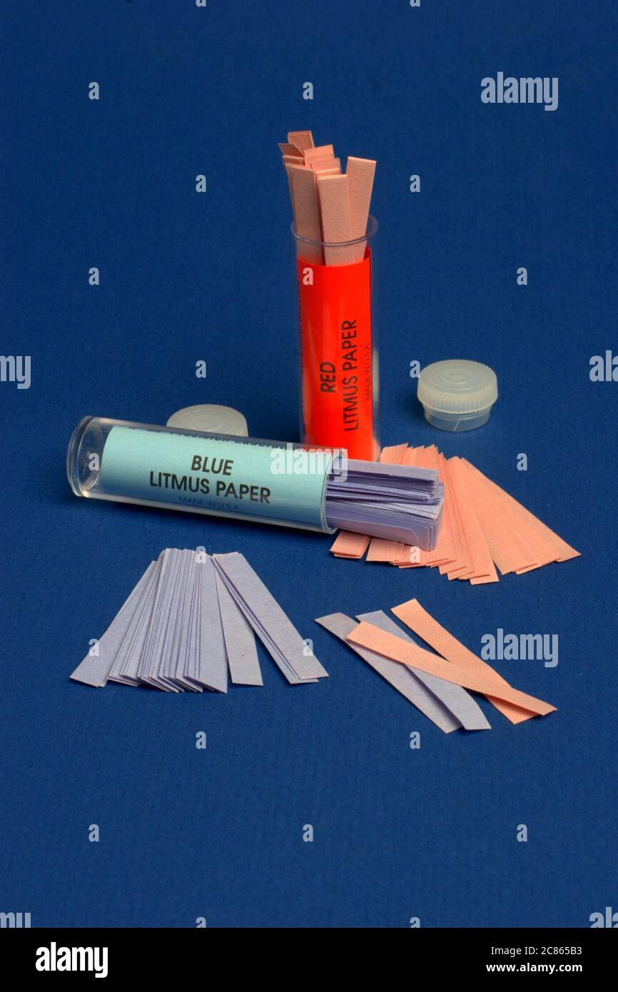 Red and blue litmus paper is used in chemistry to check the pH of liquids. ©Bob Daemmrich Stock Photo