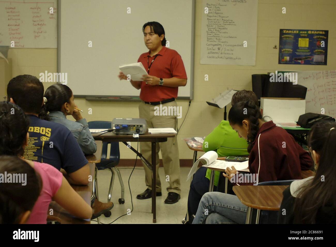 Brownsville, Texas USA, December 2, 2005: Veteran teacher lectures students in algebra class at Lopez High School, where the student population more than 99% Hispanic. ©Bob Daemmrich Stock Photo