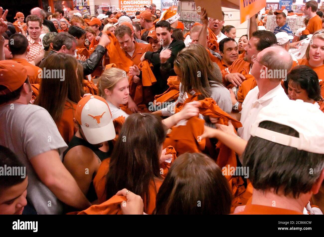 Austin, Texas USA, January 5, 2006: University of Texas football fans pack the University Co-op Bookstore as Longhorn merchandise went on sale commemorating Texas' Rose Bowl victory over USC to win the national championship. ©Bob Daemmrich Stock Photo