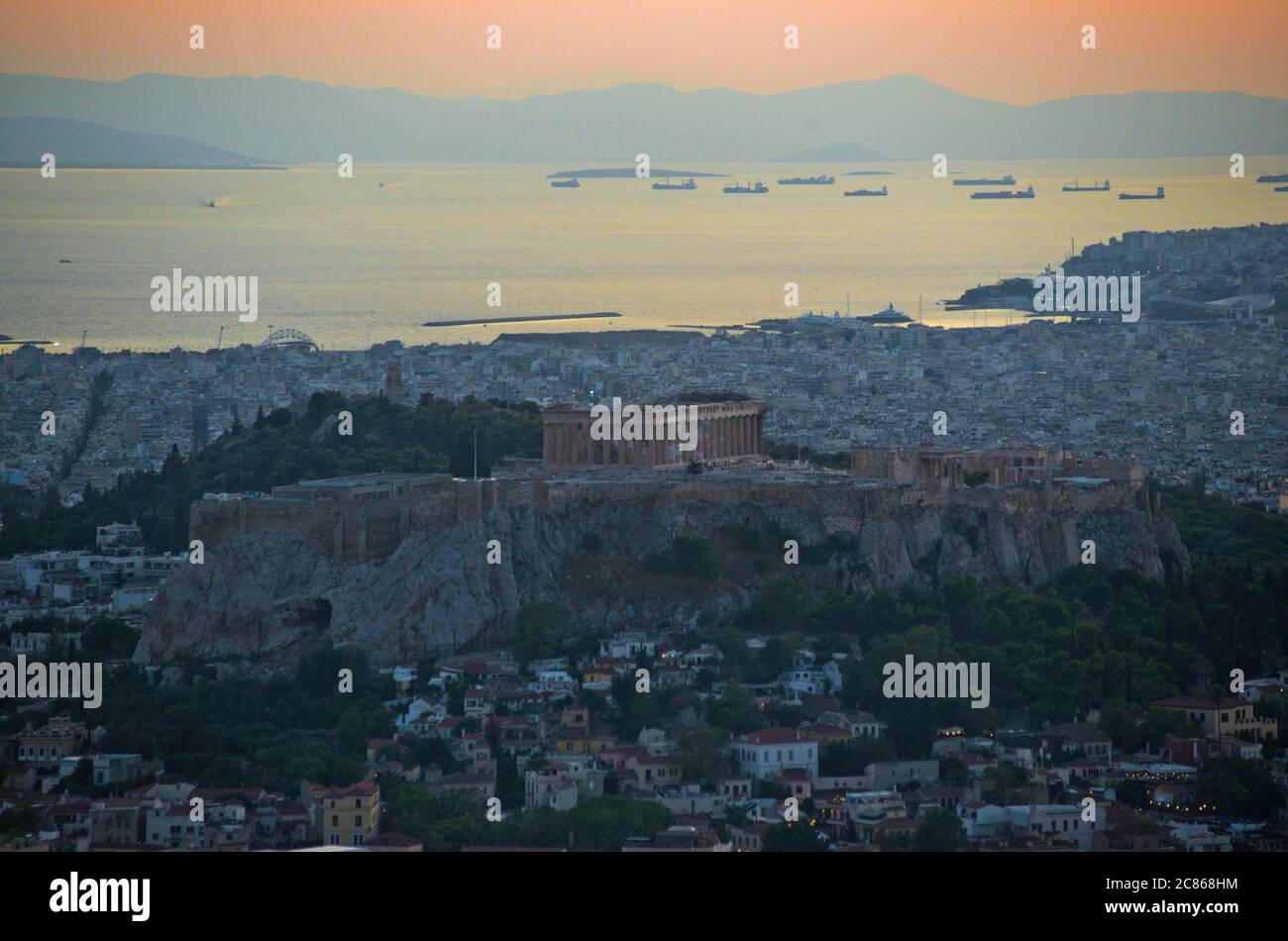 Sunset in Athens, view from Lycabettus Mountain with the Acropolis and the Parthenon at twilight. Greece Stock Photo