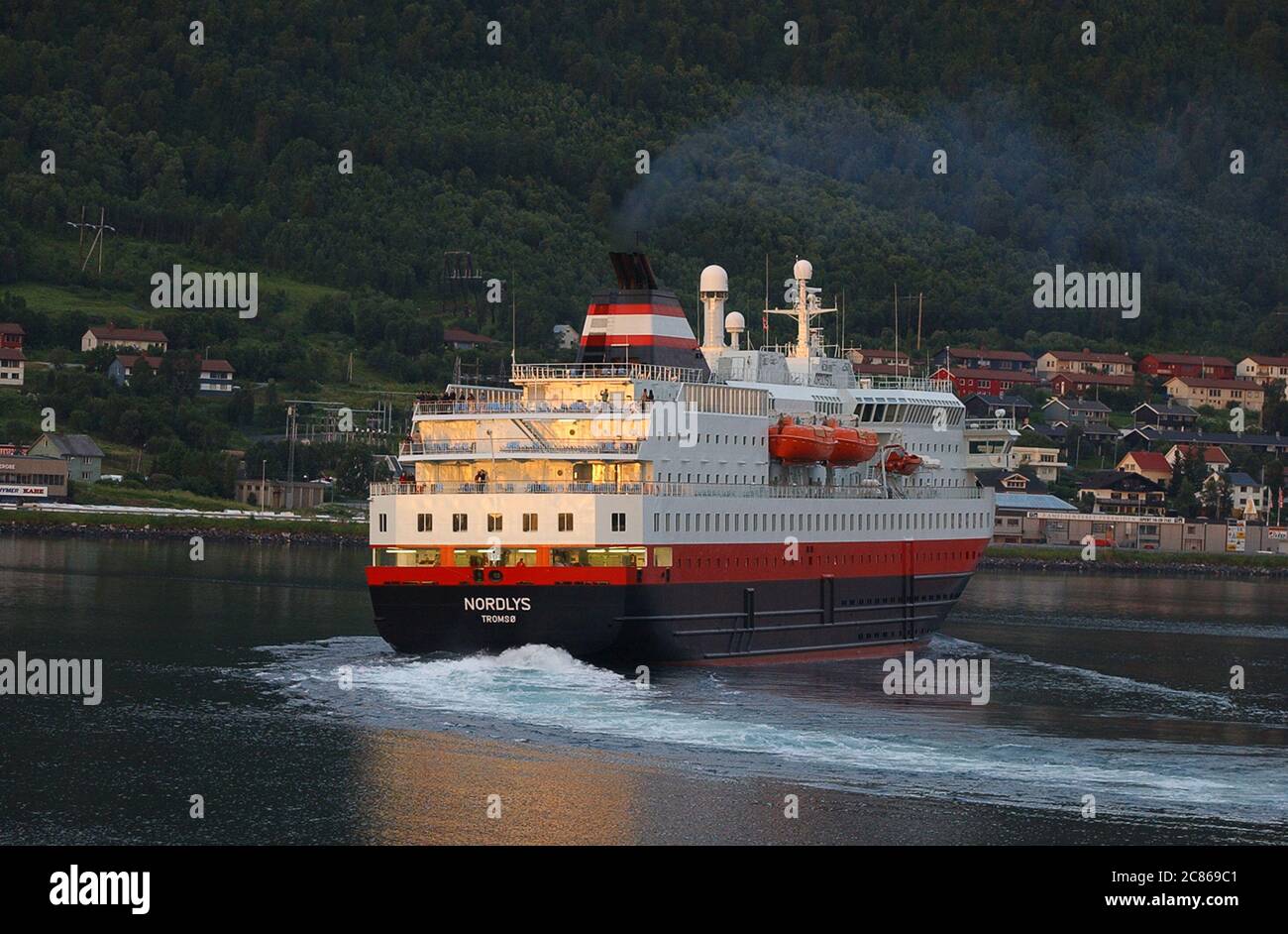 MS Nordlys cruise ship leaving Tromso harbour during the midnight sun in Norway in July 2004 Stock Photo