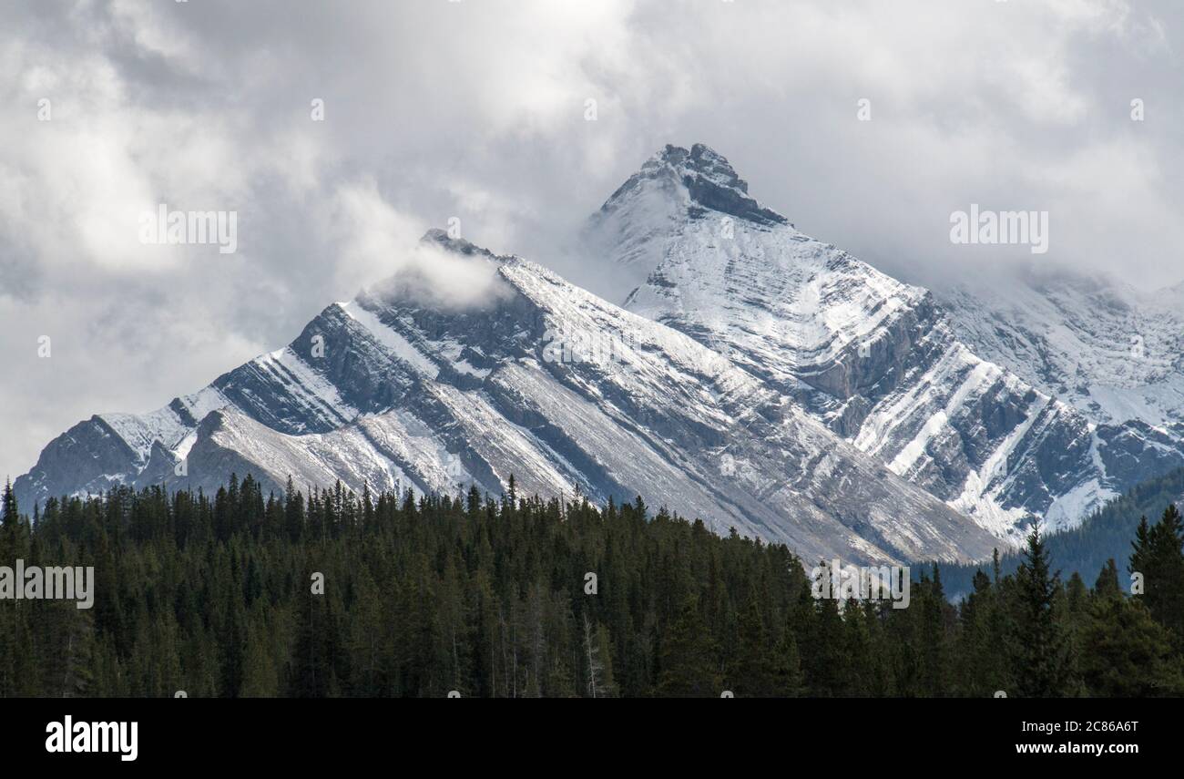 Huge, chiseled blocks up stone make up this impressive mountain in Kananaskis country, Alberta, Canada. Stock Photo