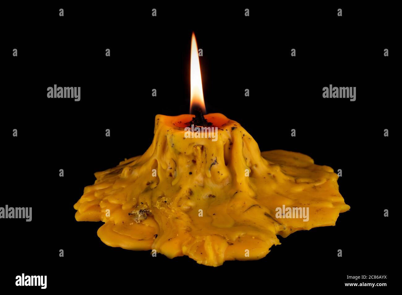 light flame candle burning brightly on black background Stock Photo