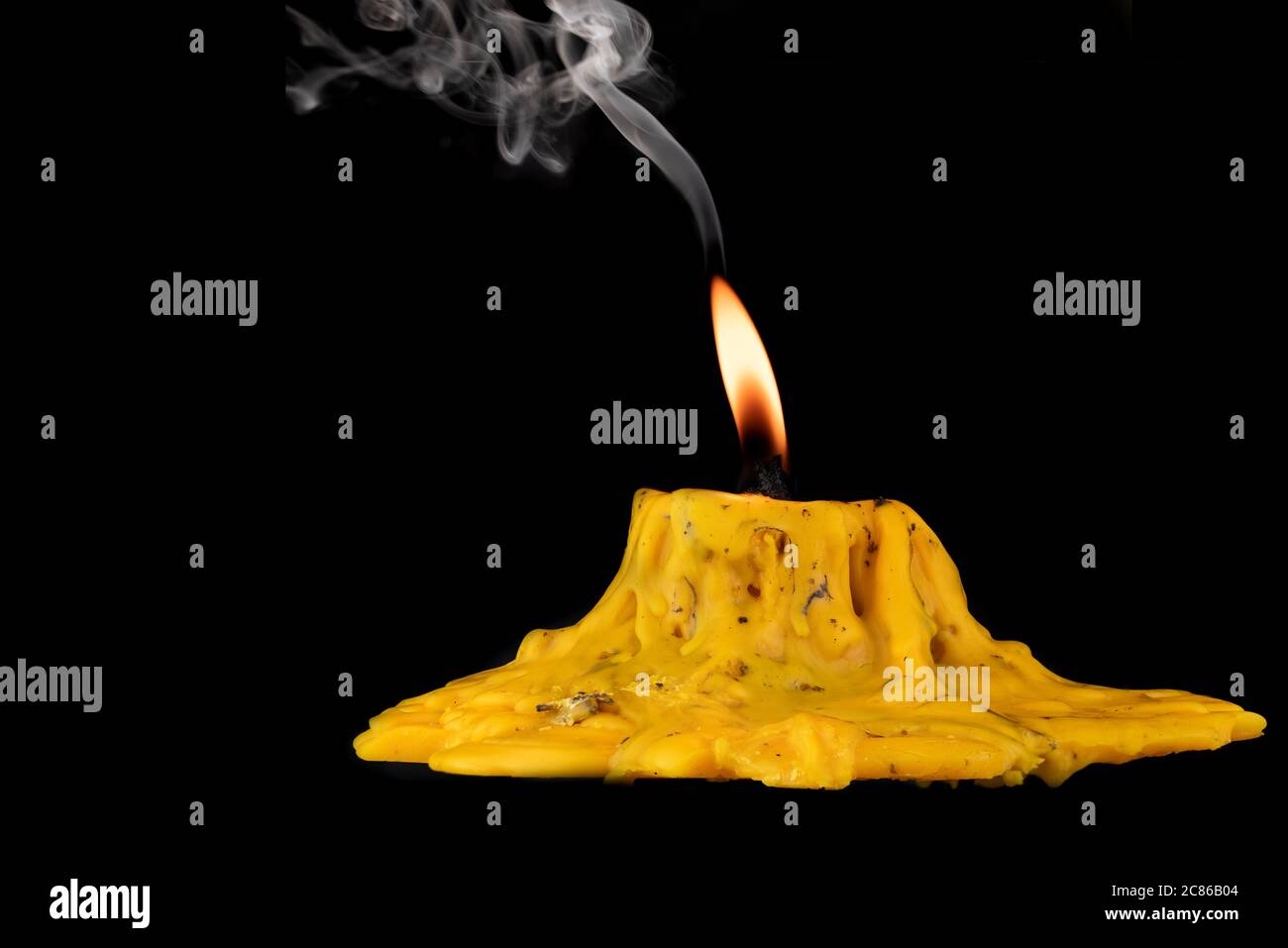 light flame candle burning brightly on black background Stock Photo
