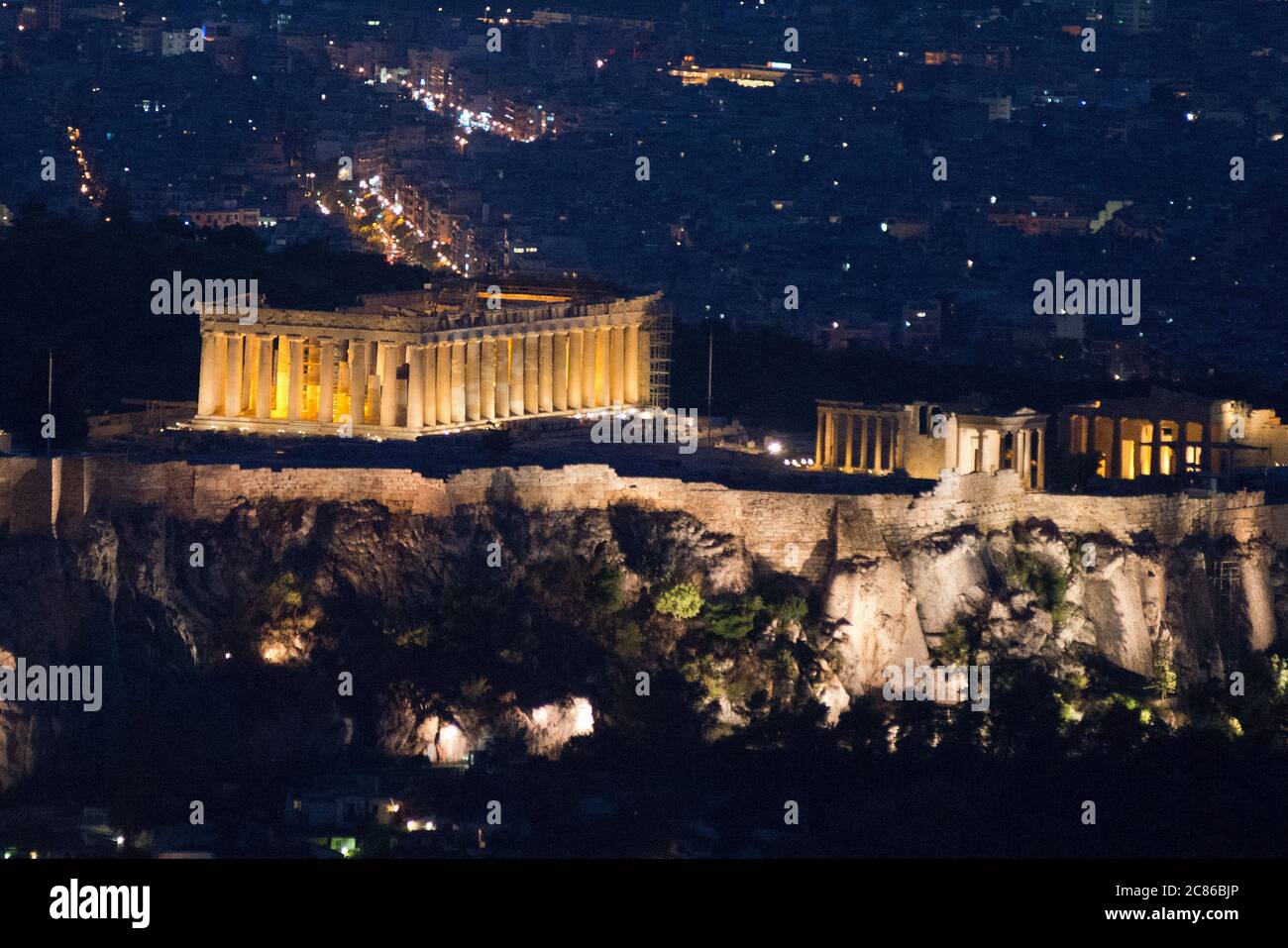 Sundown in Athens, view from Lycabettus Mountain with the Acropolis and the Parthenon at twilight. Greece Stock Photo