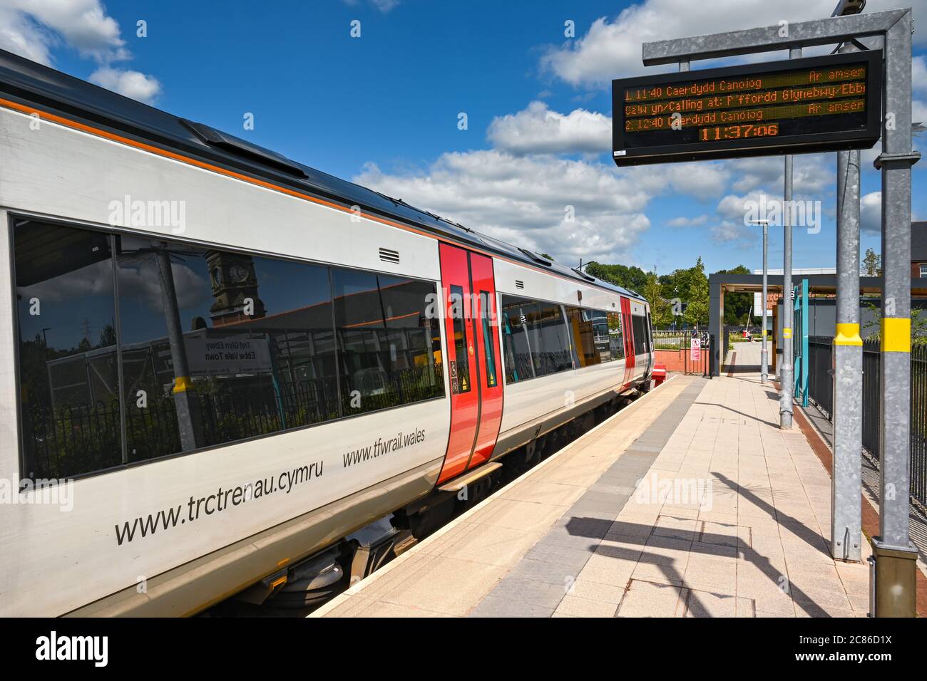 Ebbw Vale, Wales - July 2020: Passenger train alongside the platform at Ebbw Vale town station. The train is in the new colours of Transport for Wales Stock Photo