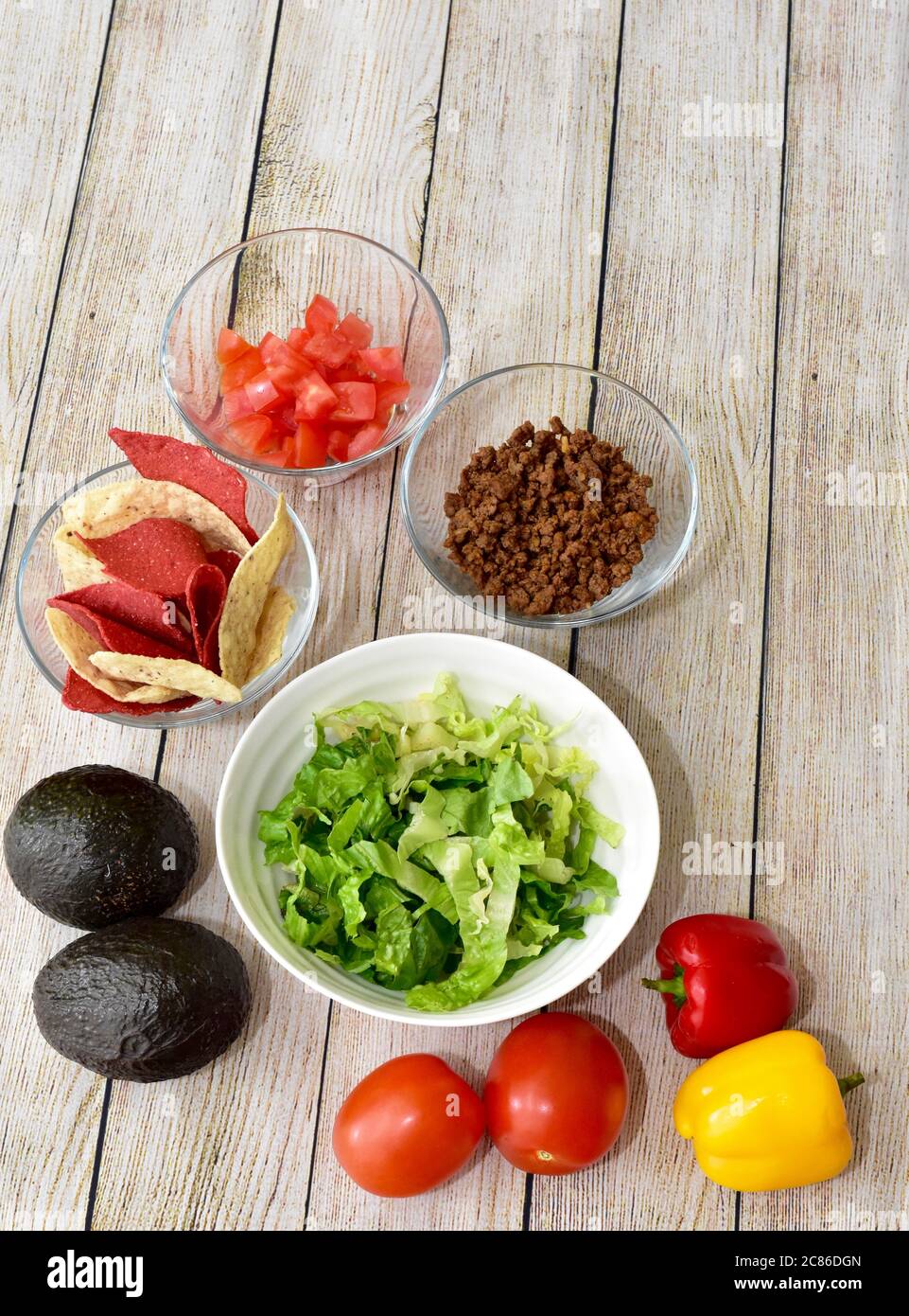 Healthy wholesome ingredients set out ready to prepare meal kit family