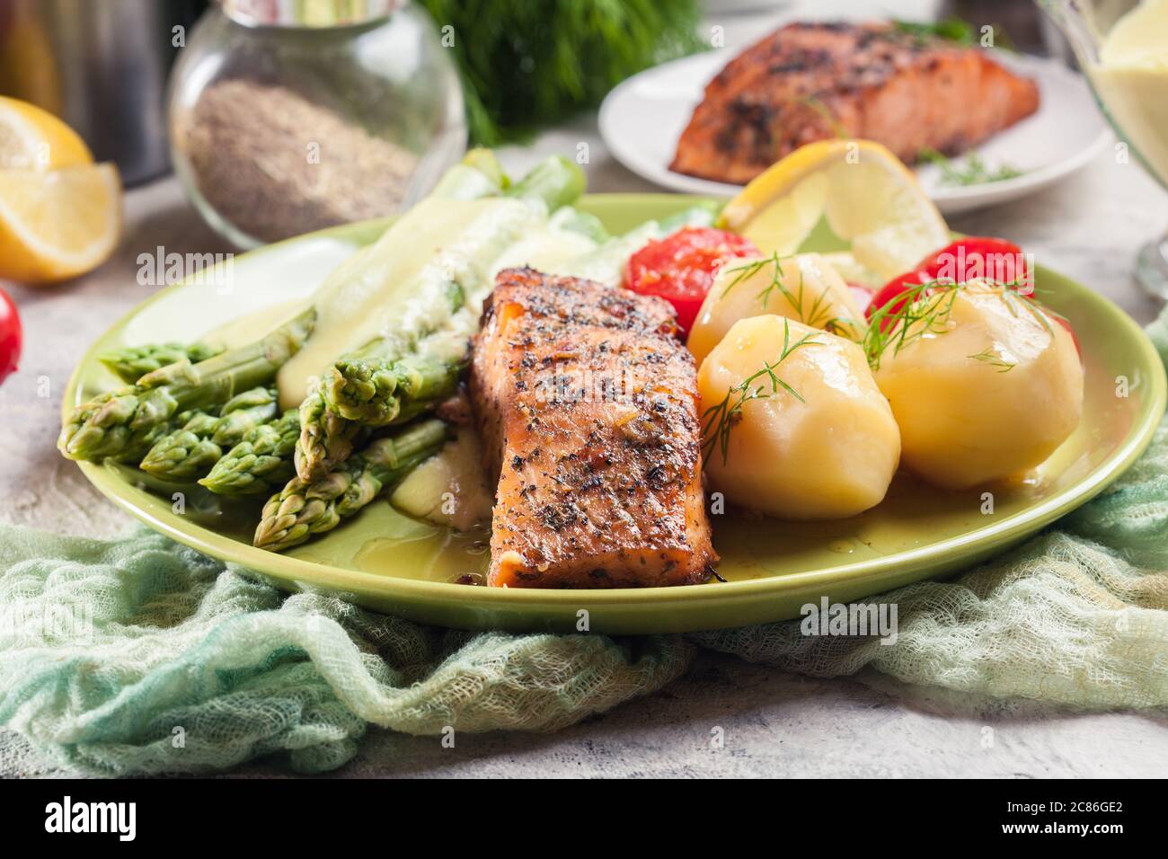 Baked salmon with asparagus and hollandaise sauce.Spring dish Stock ...