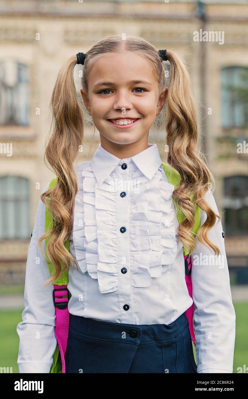 First Graders Smiling Girl smiling face going to school september, first grader concept Stock ...