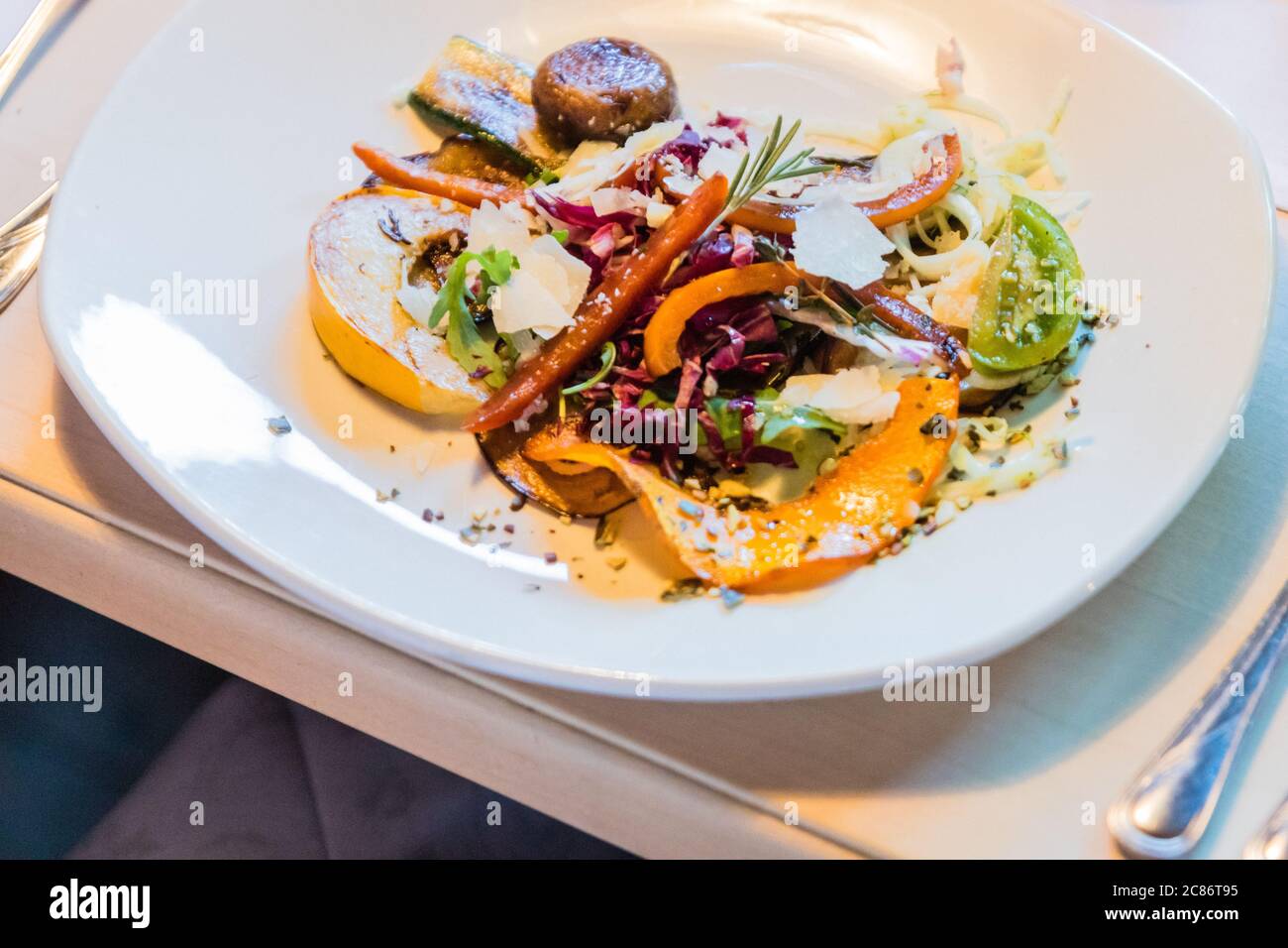 A baked vegetable dish served in restaurant Stock Photo Alamy