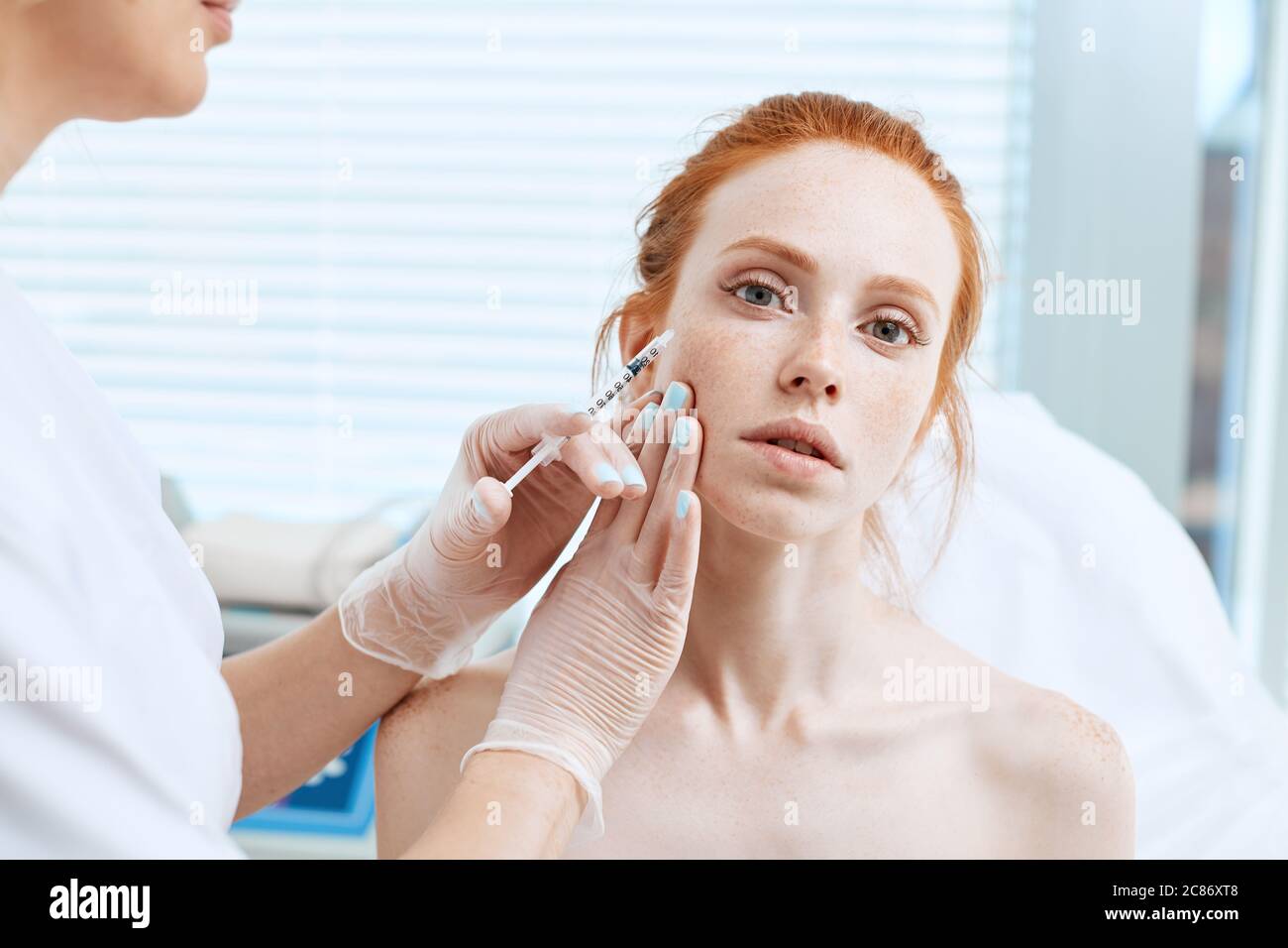 Middle aged woman having collagen hi-res stock photography and images ...