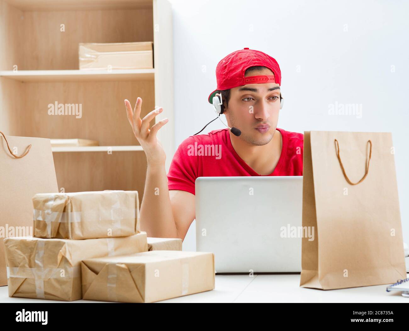 The call center worker at parcel distribution center in post office ...